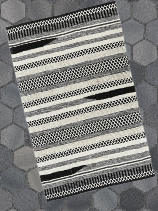 large handwoven monochrome rug